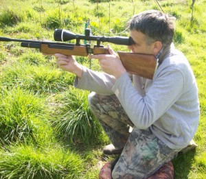 kneeling air rifle shot
